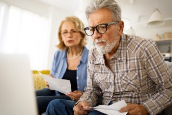 Senior couple having problems with home finances